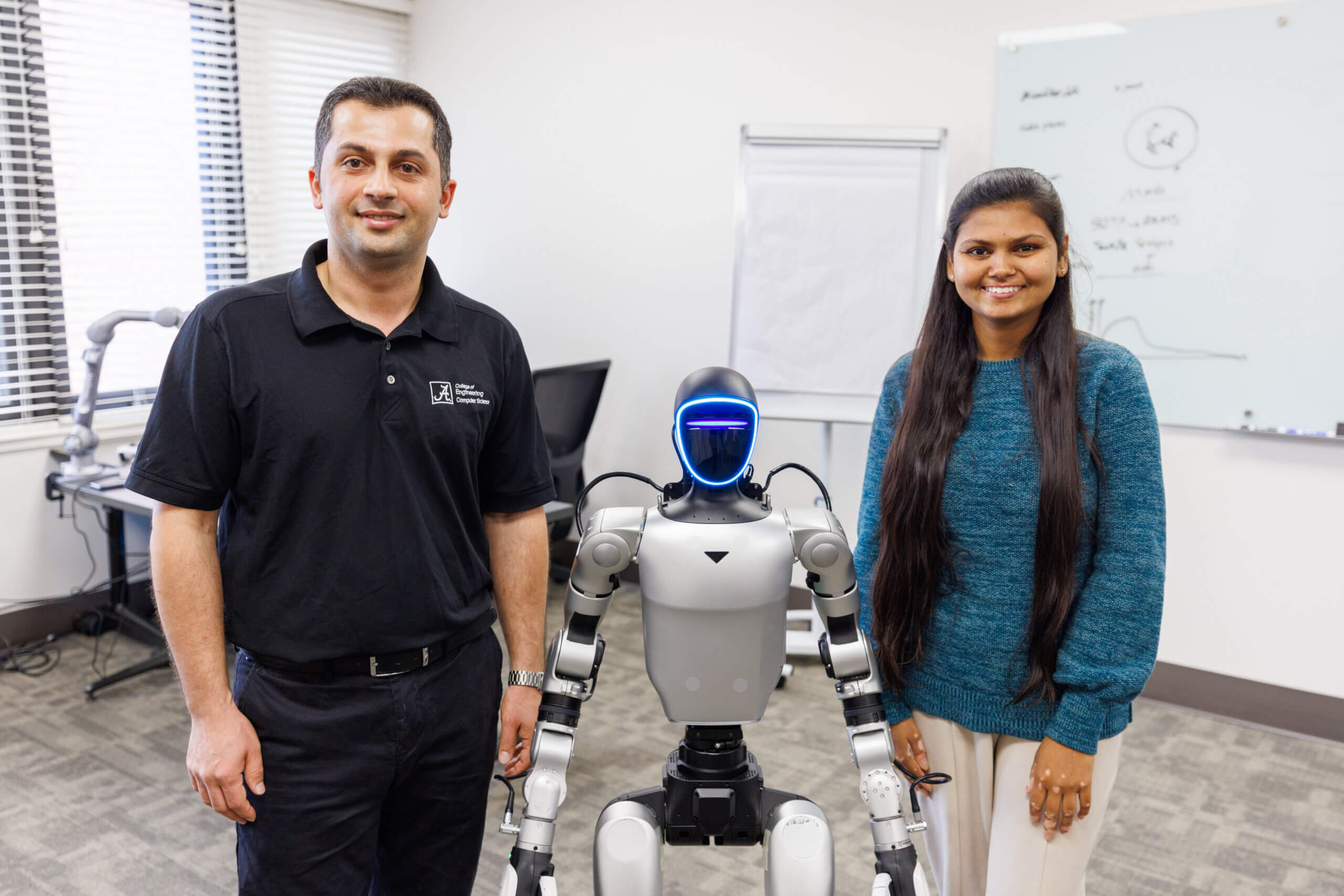University of Alabama students conducting robotics research in the BRAINS Lab